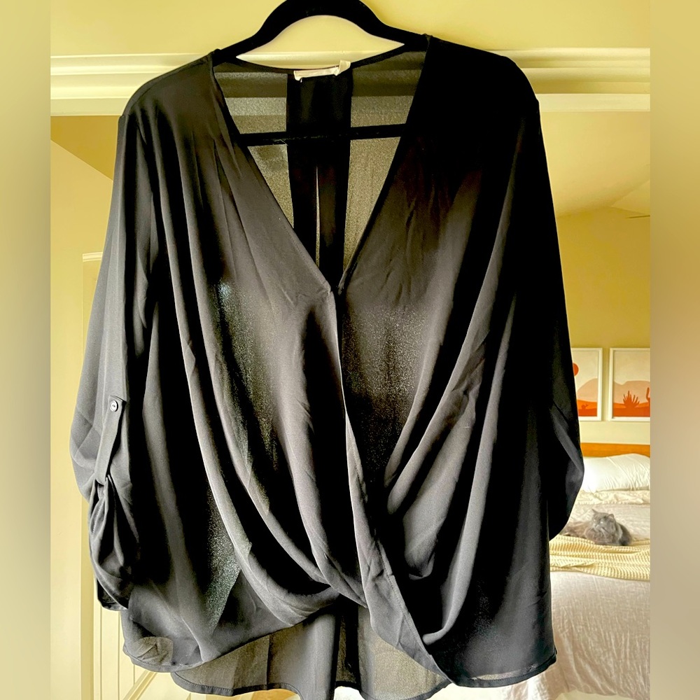 New w/o tags-never worn.  Black blouse.